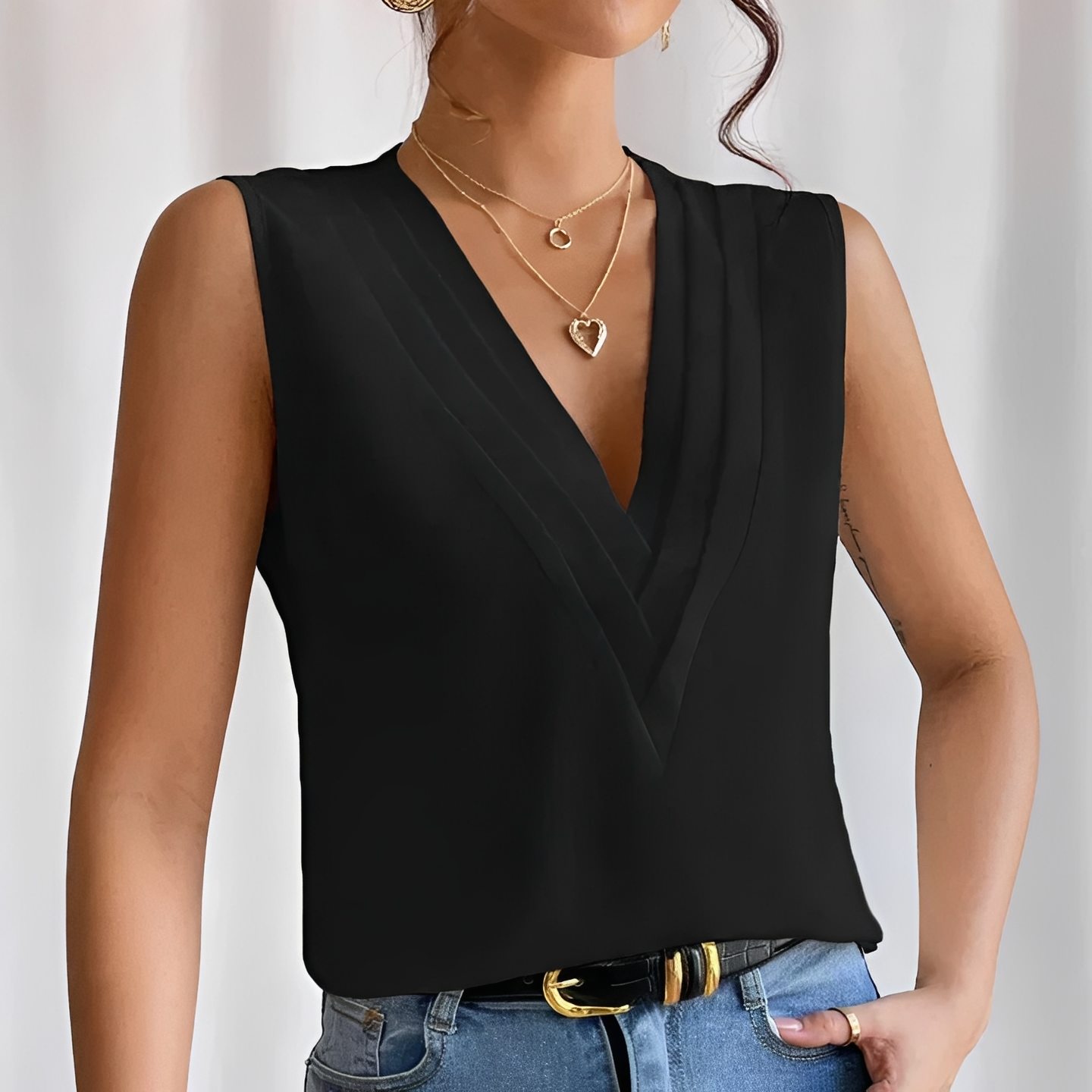 Stamatia - Elegant sleeveless blouse for women